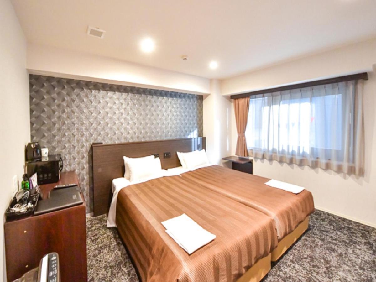 Hotel Livemax Hakataekimae Фукуока Экстерьер фото