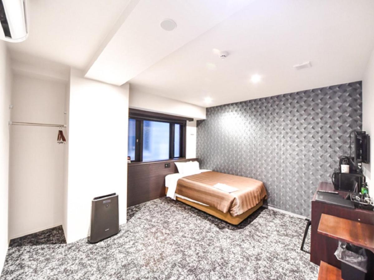 Hotel Livemax Hakataekimae Фукуока Экстерьер фото