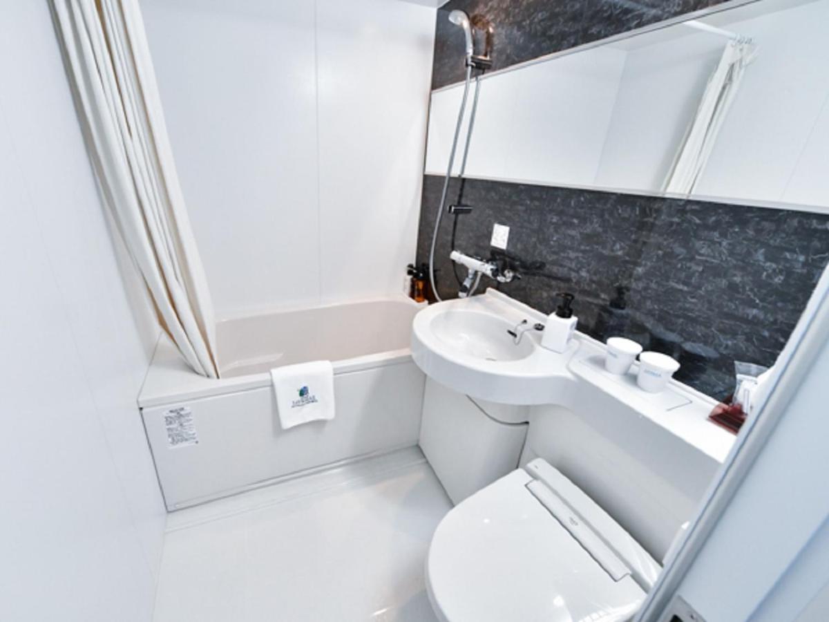 Hotel Livemax Hakataekimae Фукуока Экстерьер фото